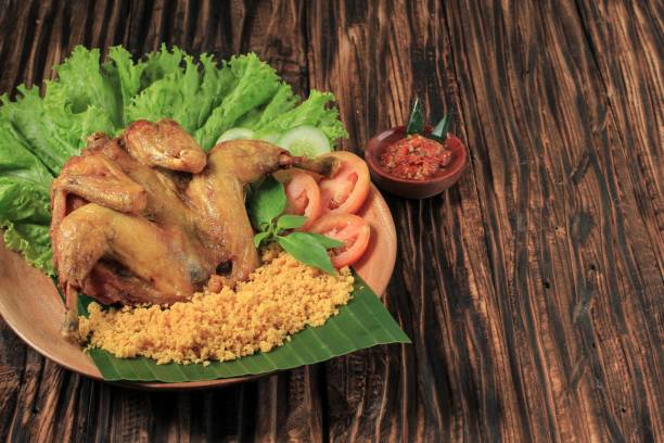 istock Ayam Goreng Utuh Kremes, Whole Chicken with Crispy Flour Batter 1999018033