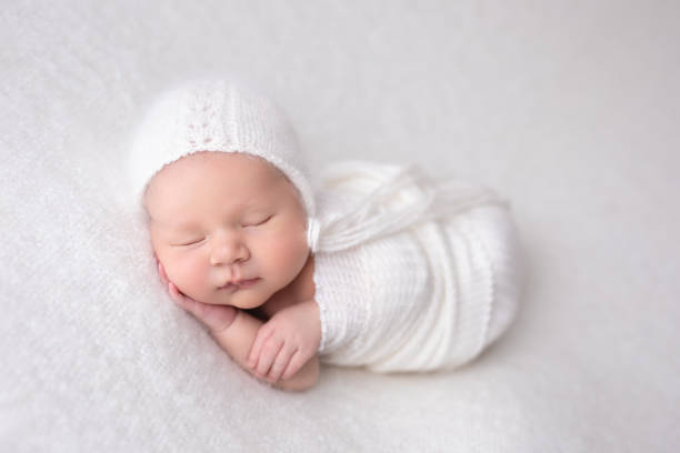 istock Newborn baby girl sleeping 1999028221