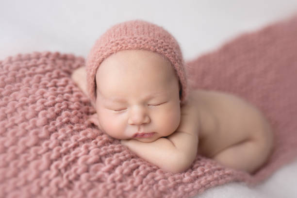 istock Newborn baby girl sleeping 1999031419