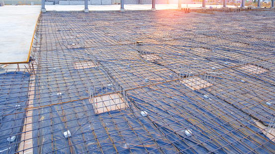 Deep Foundation Footing Reinforcement Steel with wire mesh structure on the Ground for reinforced Concrete Floor work in the Construction Site of Large Industrial Building