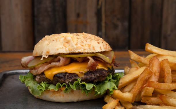 istock Delicious burger with fries 1999058613