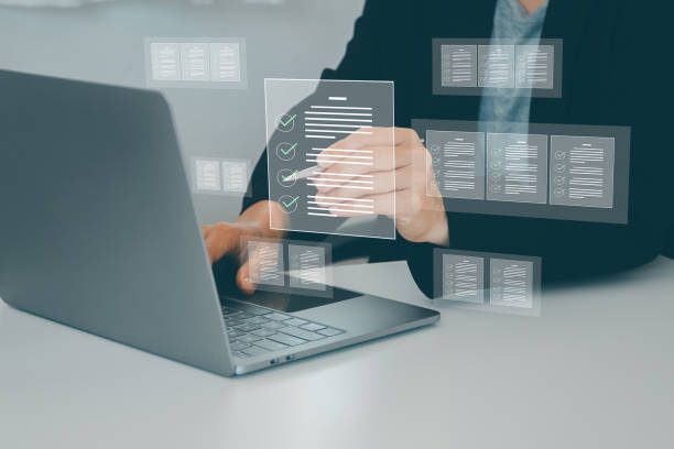 istock Document management and checklist concept, Businesswomen show e-document on smartphone online management on virtual screen automation to efficiently document paperless operation technology 1999076504