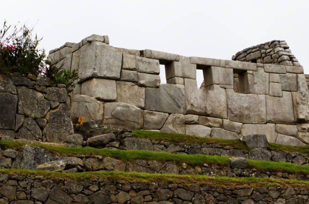 Machu Picchu Peru South America Temple Of Three Windows Inca Stone Ruins With Overcast Sky