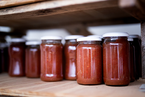 View of organic tomato paste in jars ready for winter - Buenos Aires - Argentina