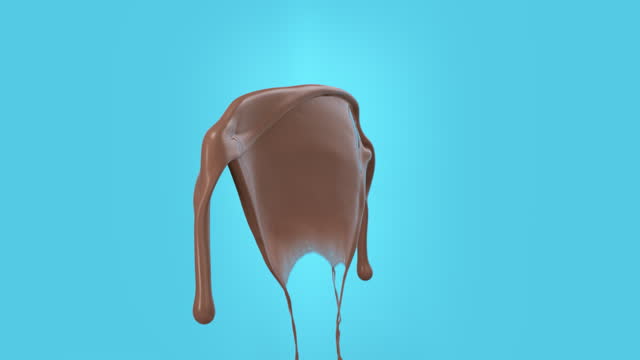 Super slow motion liquid milk chocolate eruption splash cut out on blue background