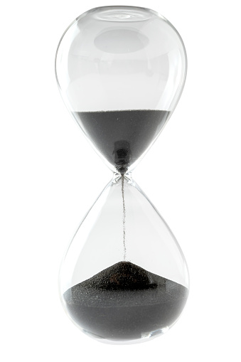Hourglass or sandglass isolated over a white background