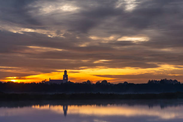 Lakeside at sunrise. Beautiful summer landscape.