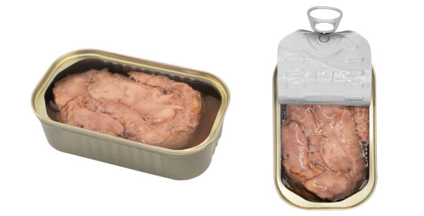 istock Packaging of canned cod liver isolated on white background. Preserved Atlantic cod liver. Open tin can of tasty cod liver isolated 1999593838