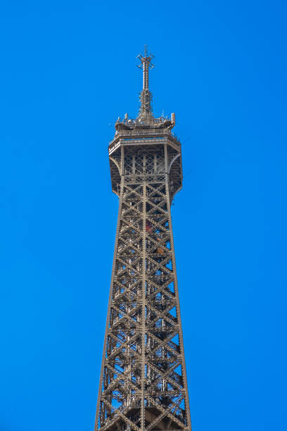 istock Top of the Eiffel Tower with a clear blue sky in Paris 1999667230