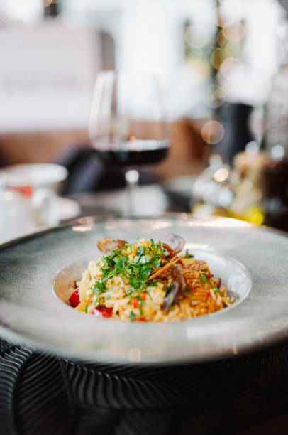 istock Classic Risotto with mushrooms and vegetables 1999702567