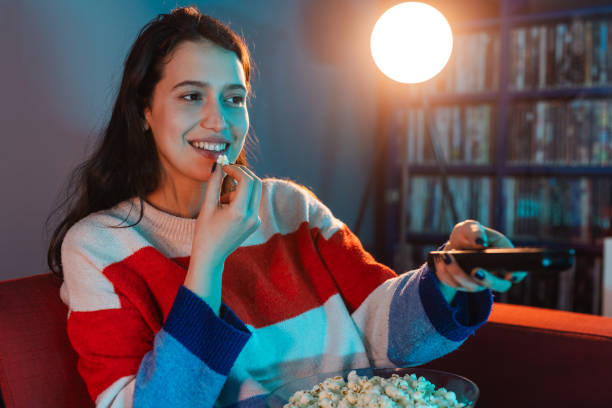 istock Relaxing night at home. TV entertainment 1999706840
