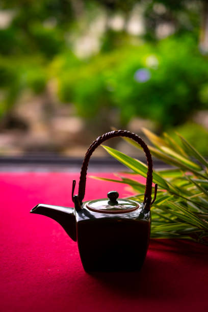 Japanese teapot and bamboo grass.