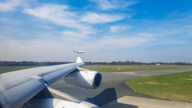 Dussledorf, Germany - march 24, 2017 - getting ready for takeoff after landing besid lufthansa planes in dusseldorf international airport runway, landing and takeoff