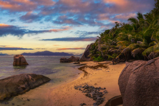 istock Sunset over Anse Source D'argent beach at La Digue Island, Seychelles 1999853159