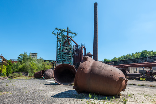 Hattingen, Germany - August 9, 2022: Old industrial plants and a blast furnace, disused Henrichshuette steel works, now an industrial heritage museum, Hattingen, North Rhine-Westphalia, Germany. Abandoned steel mill.