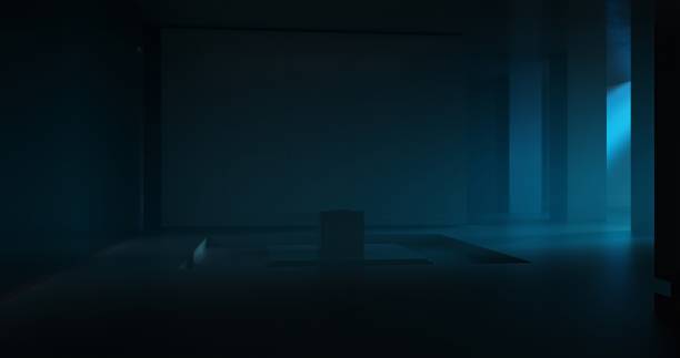 Amidst the backdrop of a dark room enveloped in night, a closed laptop perched on a pedestal adds a touch of modern elegance, quietly emanating a subtle glow that adds a touch of tranquility to the space