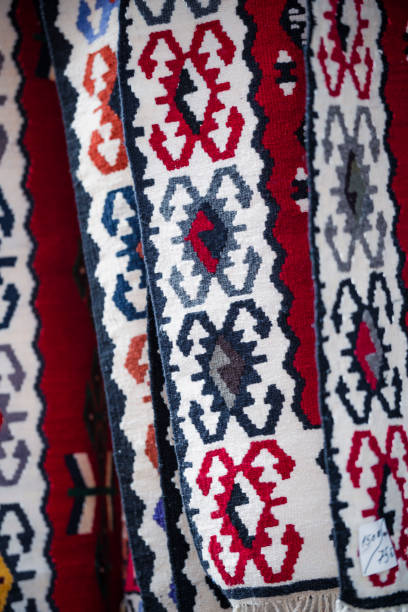 istock Colorful hand made carpets in a shop 1999933550