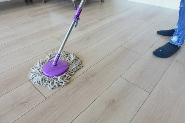 istock cleaning tiles floor with mop 1999937246