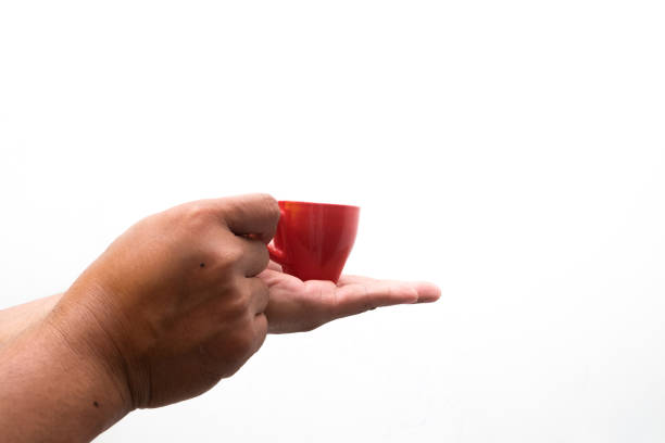 man's hand holding a red cup isolated on a white background
