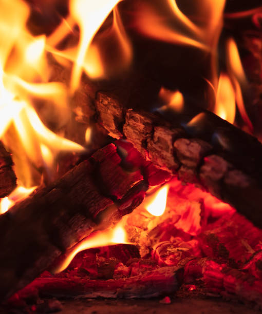 istock Fire flame from wooden firewood. Background 1999983905