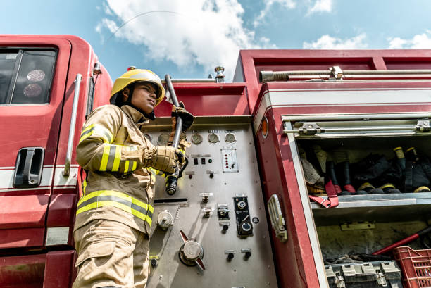 istock Young fireman holding a fire hose outdoors 2000000208