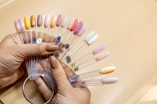 A palette of gel varnishes in bright colors can offer a wide range of options for creating fun and vibrant nail designs.