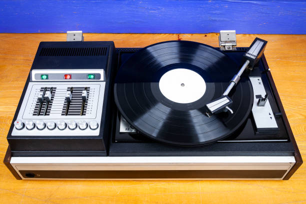 istock Vintage turntable vinyl record player with black vinyl 2000029798