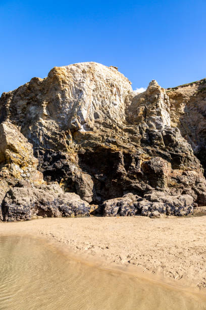 istock A blue sky over rocks on the beach at Perranporth in Cornwall 2000037251
