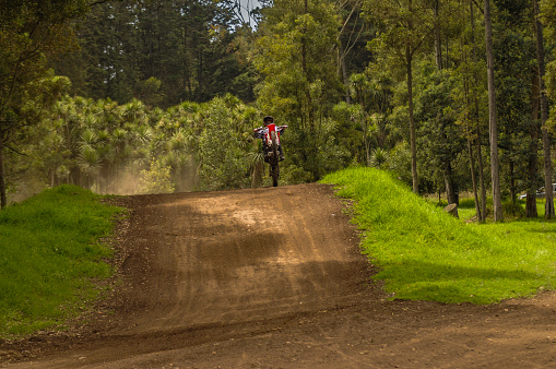 Bogota . Colombia 3 de Mayo 2014: Motocross track trail through a pine forest