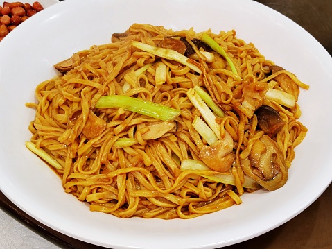Baby Bok choy or chinese cabbage in mushroom vegetarian sauce with Shitake Mushrooms and fried garlic