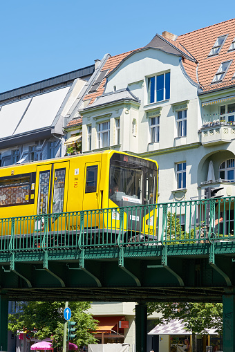 Berlin, Germany – May 30, 2023: The U2 subway train U-Bahn, Hochbahn on its journey through the Berlin district of Prenzlauer Berg