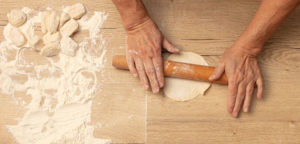 istock Rolling out the dough with your hands. 2000172913