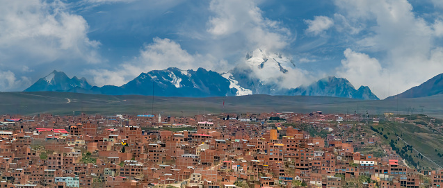 Huayna PotosÃ­ mountain as seen from El Alto, La Paz, Bolivia. With an elevation of 6,088 m (ca. 20,000 feet),