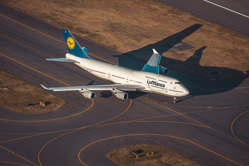 boston, United States – August 31, 2022: A Lufthansa Boeing 747 taxiing Boston's Logan International Airport before a flight to Germany