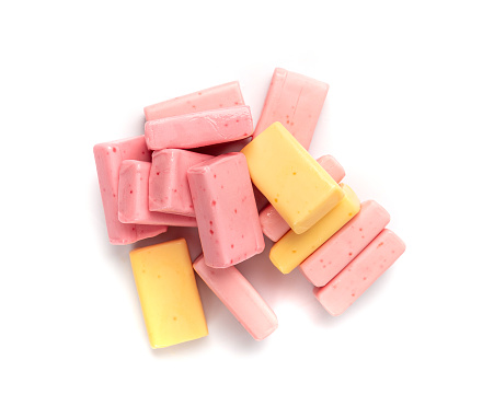 Fruit Chews Isolated, Pink Chewable Candies Pile, Fruit Chew Candy Pile, Square Taffy, Colorful Gummy Candies on White Background Top View