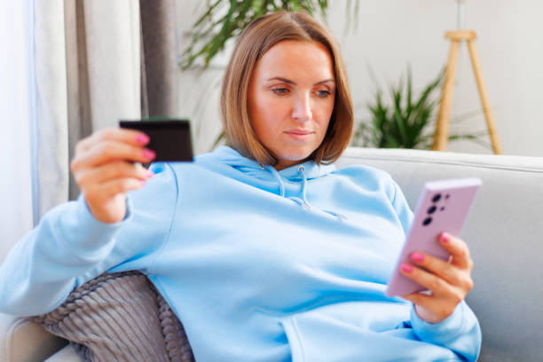 istock Woman Shopping Online at Home 2000199078
