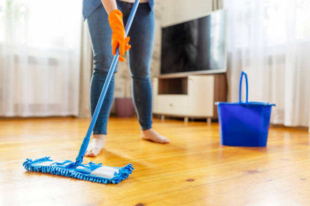 istock Person Cleaning Floor with Mop and Bucket 2000200124