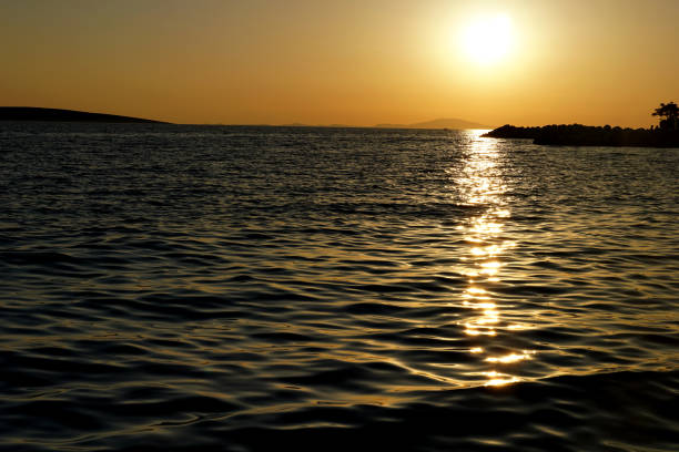 Dusky orange sunset on the Croatian sea coast and unpolluted environment
