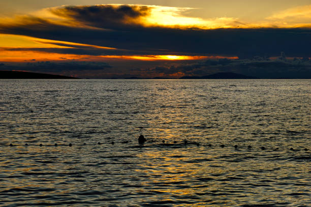 istock Shiny sunset above wide Adriatic sea in Croatia 2000218294