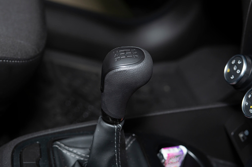 The manual transmission of the car.The car's interior design.