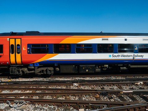 London, United Kingdom - May 19, 2018: New train wagon of South Western Railway with clear blue sky in bakground
