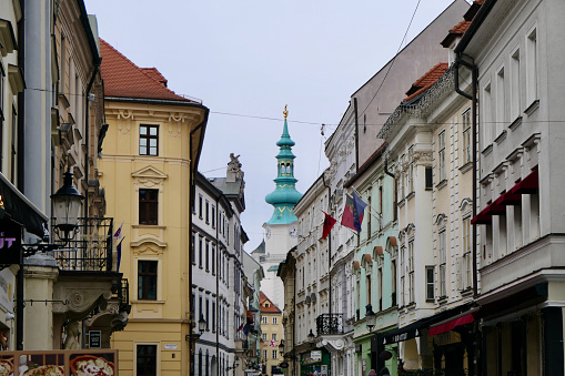 This thoroughfare in Old Town Bratislava leading to Michael's Tower can only be described as busy in appearance, with its ornate facades, flags, street lights and wrought iron balconies.