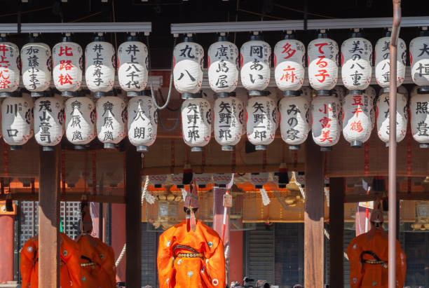 Kyoto, Japan - February 2, 2019: People dressed in traditional attire dancing in Setsubun Festival at Yasaka Shrine