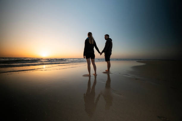 istock Silhouette of a Couple at Sunrise 2000409264