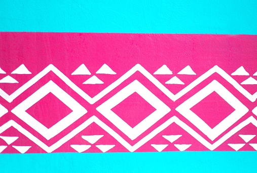 Mexico: Colorful Turquoise Wall with Hot Pink Design. Shot in Oaxaca.