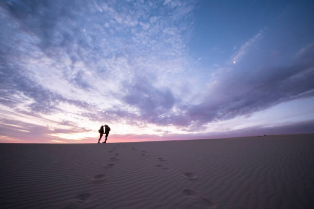 istock Silhouette of a Couple at Sunrise 2000448692