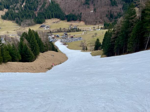 istock No snow on skiing slopes in winter due to climate change. 2000465052