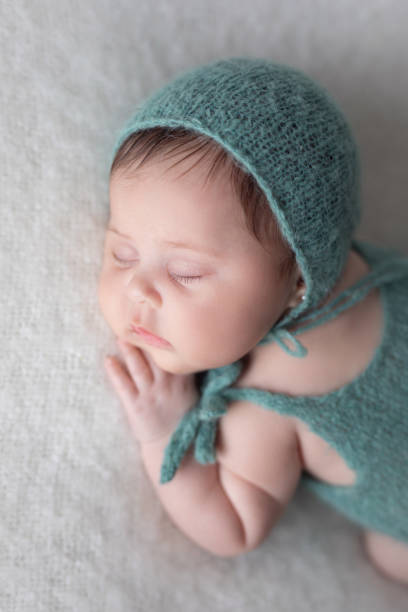istock Newborn baby girl sleeping 2000466212