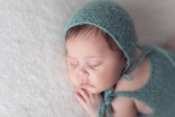 istock Newborn baby girl sleeping 2000466237