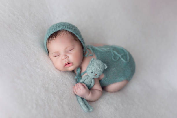 istock Newborn baby girl sleeping 2000467287
